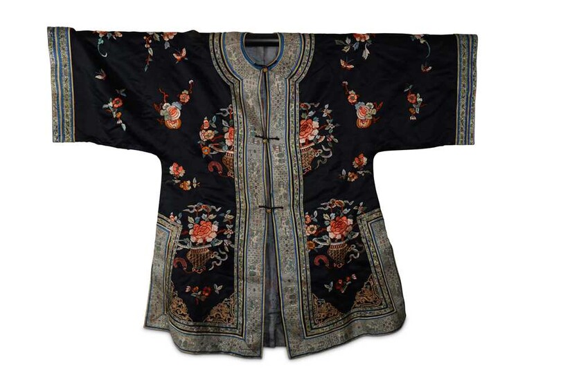 A CHINESE DARK BLUE-GROUND EMBROIDERED SILK LADY'S JACKET.