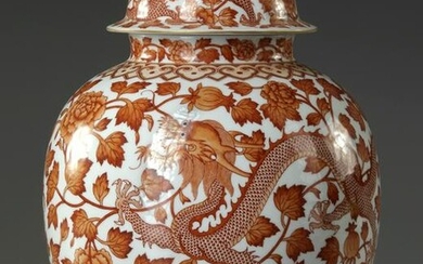 A CHINESE IRON-RED DECORATED 'DRAGON AND PHOENIX' JAR