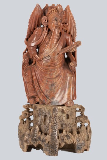 A Carved Hardstone Figurine.