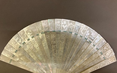 A Chinese Mother of pearl brisé fan, with 21 inner sticks an...