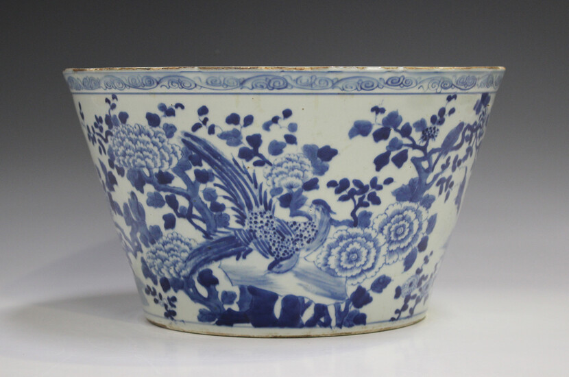 A Chinese blue and white porcelain bowl, mark of Kangxi but later Qing dynasty, of circular tapering