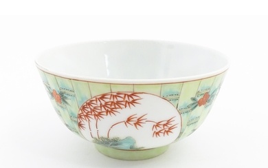 A Chinese famille verte bowl decorated with stylised bamboo ...