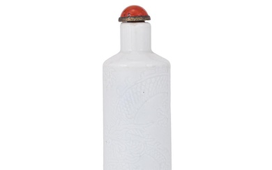 A Chinese white glazed 'Dragon' snuff bottle