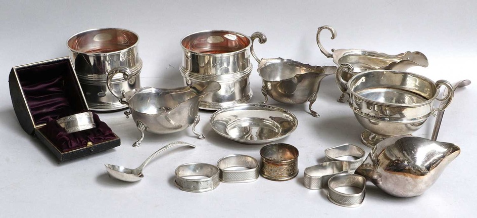 A Collection of Assorted Silver, including a set of four...