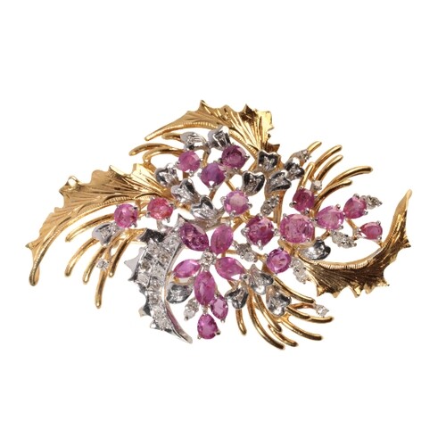 A DIAMOND AND RUBY SPAY BROOCH set in unmarked yellow and wh...