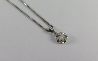 A DIAMOND AND WHITE GOLD PENDANT AND CHAIN