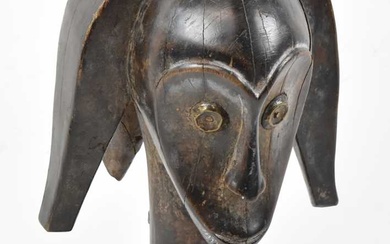 A Fang, Gabon, figural mask head presented on contemporary plinth...