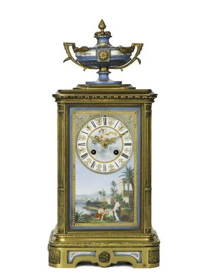 A French gilt-bronze and porcelain mantel clock