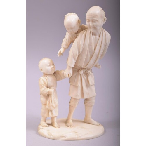 A GOOD JAPANESE MEIJI CARVED IVORY OKIMONO of a man and his ...