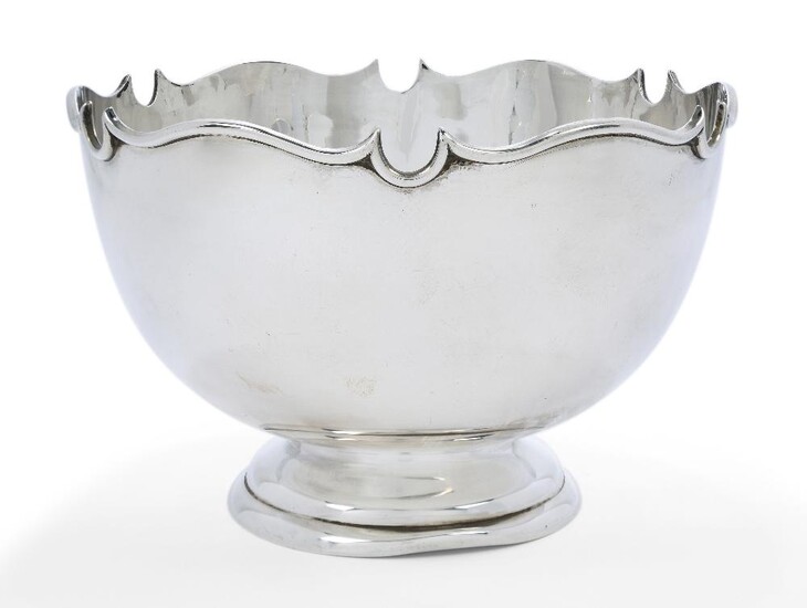 A George V silver Monteith-style punch bowl, Birmingham, 1935, Barker Brothers, of plain circular form with shaped rim and raised on a stepped circular foot, 16cm high, 24.8cm dia., approx. weight 30.3oz