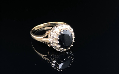 A HALLMARKED 9ct GOLD SAPPHIRE AND DIAMOND CLUSTER RING. FINGER SIZE N. WEIGHT 3.33grms.