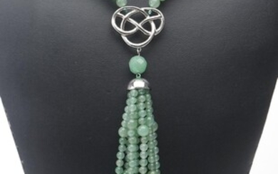 A JADE BEAD NECKLACE BY SHANGHAI TANG WITH CENTRAL SILVER FEATURE AND EIGHT STRAND JADE BEAD TASSELL PENDANT TOTAL LENGTH 650 MM EXC...