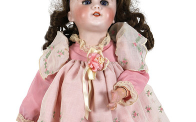 A Jumeau Depose Bebe bisque socket head doll