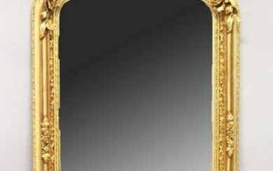A LARGE ORNATE GILT FRAMED ARCH TOP MIRROR, the top