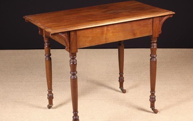A Late Victorian/Early Edwardian Mahogany Side Table. The rectangular top with moulded edge above fa
