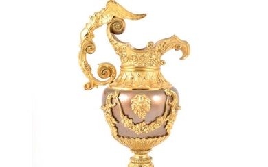 A Louis Philippe style bronzed and gilt metal ornamental ewer