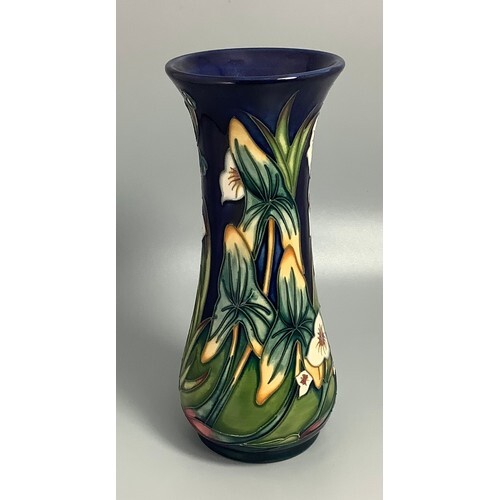 A Moorcroft pottery vase of baluster form with flared rim, d...