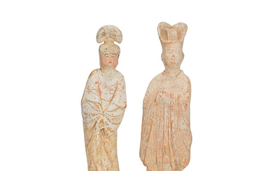 A PAINTED POTTERY FIGURE OF A COURT LADY AND A...