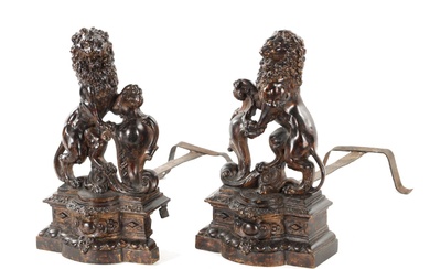 A PAIR OF 19TH CENTURY BRONZE SCULPTURED CHENETS modelled...