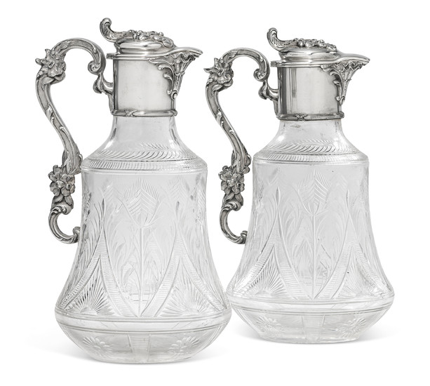 A PAIR OF PARCEL-GILT SILVER-MOUNTED CUT-GLASS DECANTERS, MARKED K. FABERGÉ WITH IMPERIAL WARRANT, MOSCOW, CIRCA 1890, SCRATCHED INVENTORY NUMBER 9822
