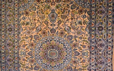 A PERSIAN KASHMAR CARPET. 100% WOOL. SOLID & DENSE PILE. HAND-KNOTTED AND WITH KASHMAR DESIGN OF SUNBURST MEDALLION OF PALMETTES & Q...