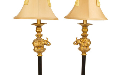 A Pair of Empire Style Ebonized and Gilt Metal Elephant Candlesticks now Mounted as Lamps