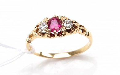 A RUBY AND DIAMOND DRESS RING, THE OVAL CUT RUBY ESTIMATED 0.54CTS AND DIAMONDS TOTALLING 0.16CTS, IN 18CT GOLD, SIZE N, 2.5GMS