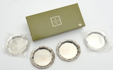 A SET OF FOUR CHRISTOFLE SILVER PLATE COASTERS, BOXED