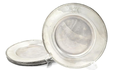 A Set of Eight American Silver Bread and Butter Plates