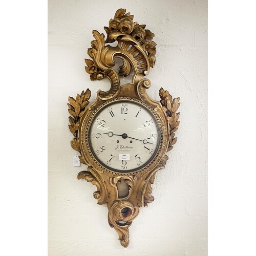 A Swedish rococo carved gilt wood cartel clock, the 10 in pa...