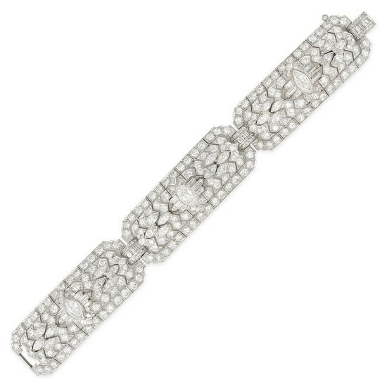 A VINTAGE DIAMOND BRACELET in platinum, comprising three openwork sections set with marquise