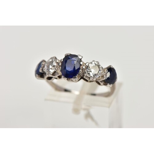 A WHITE METAL DIAMOND AND SAPPHIRE FIVE STONE RING, designed...