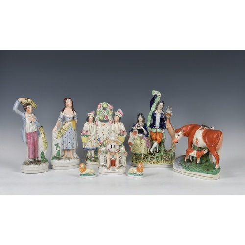 A collection of Staffordshire Pottery flat back figures and ...