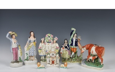 A collection of Staffordshire Pottery flat back figures and ...