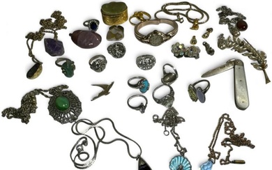 A collection of silver and costume jewellery. To include five...