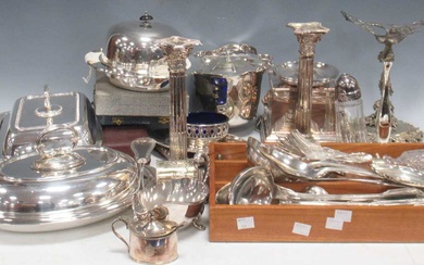 A collection of silver plated ware to include entree dishes, muffin dish, a pair of candlesticks