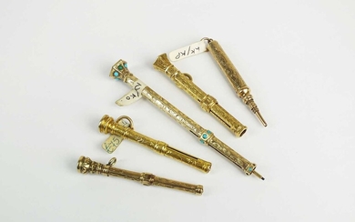 A collection of yellow metal and gilt metal retractable pencils