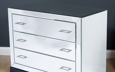 A contemporary mirrored three drawer chest