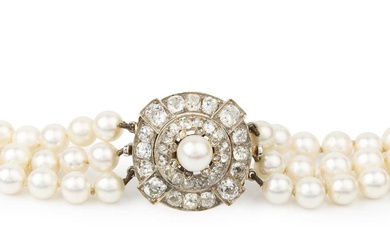 A cultured pearl three strand necklace with diamond clasp, the...