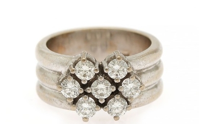 A diamond ring set with seven brilliant-cut diamons, totalling app. 0.70 ct., mounted in 14k white gold. W. 10 mm. Size 47.