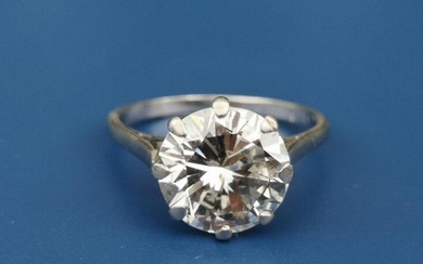 A diamond solitaire ring, the claw set brilliant weighing...