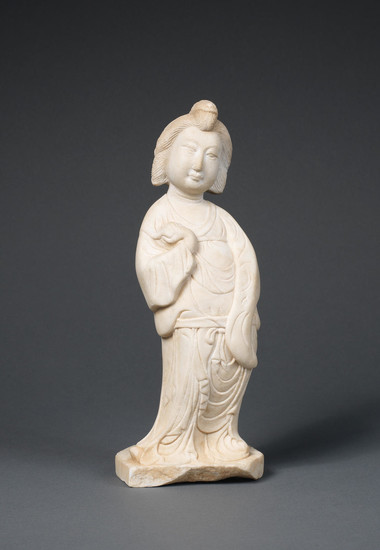 A fine and rare white marble figure of a court lady