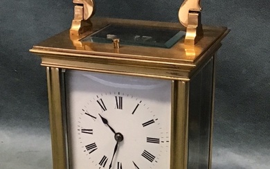 A gilt brass gorge cased repeating carriage clock, with bevelled...