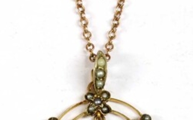 A gold amethyst and split pearl pendant