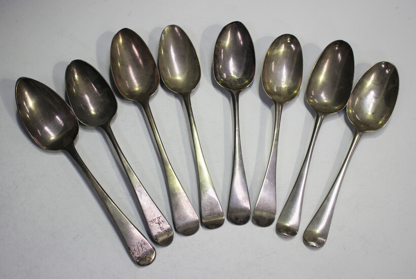A group of eight mid-18th century and later Old English pattern and Hanoverian pattern tablespoons