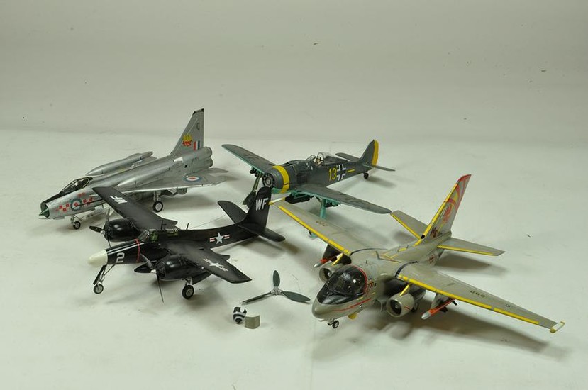 A group of plastic larger scale plastic kits.