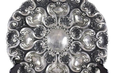A large Continental Baroque style repousse silver