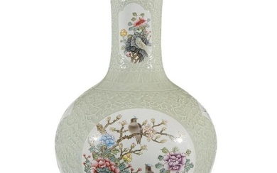 A large enameled and carved celadon-glazed vase, 20th