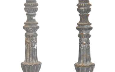 A large pair of 19th century Victorian cast iron ecclesiastical large floor standing candlestick prickers. Each of cast iron form with plinth column bases rising through to single sconces with central prickers. Measures 72cm high