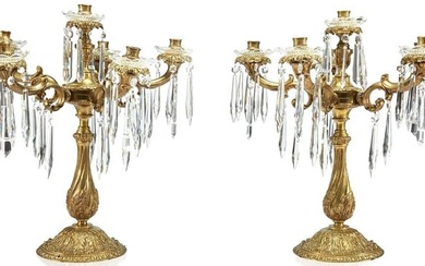 A large pair of Louis XV-style gilt-bronze and cut glass six-light candelabra